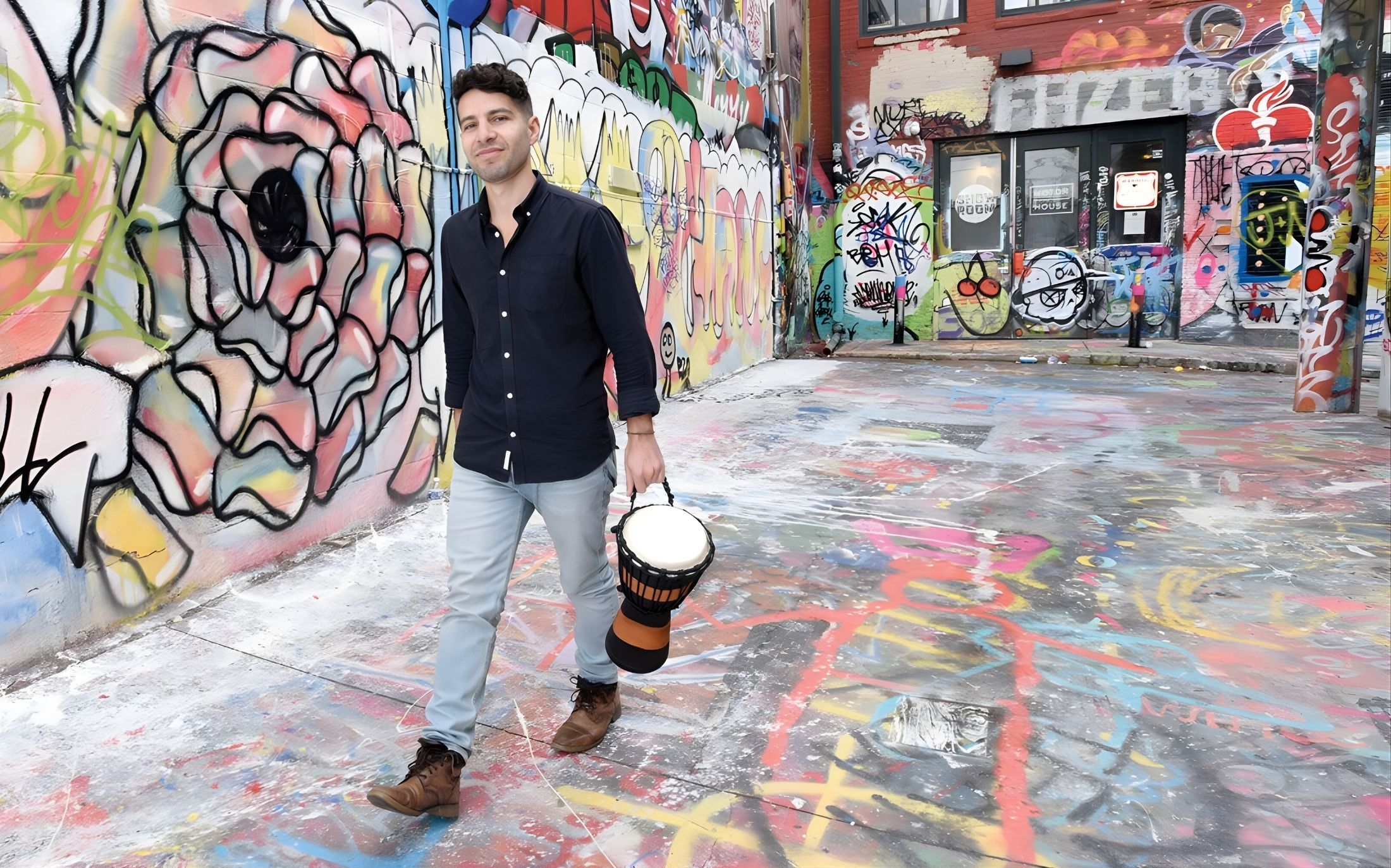 Jordan Goodman with Drum in a Graffiti Alley