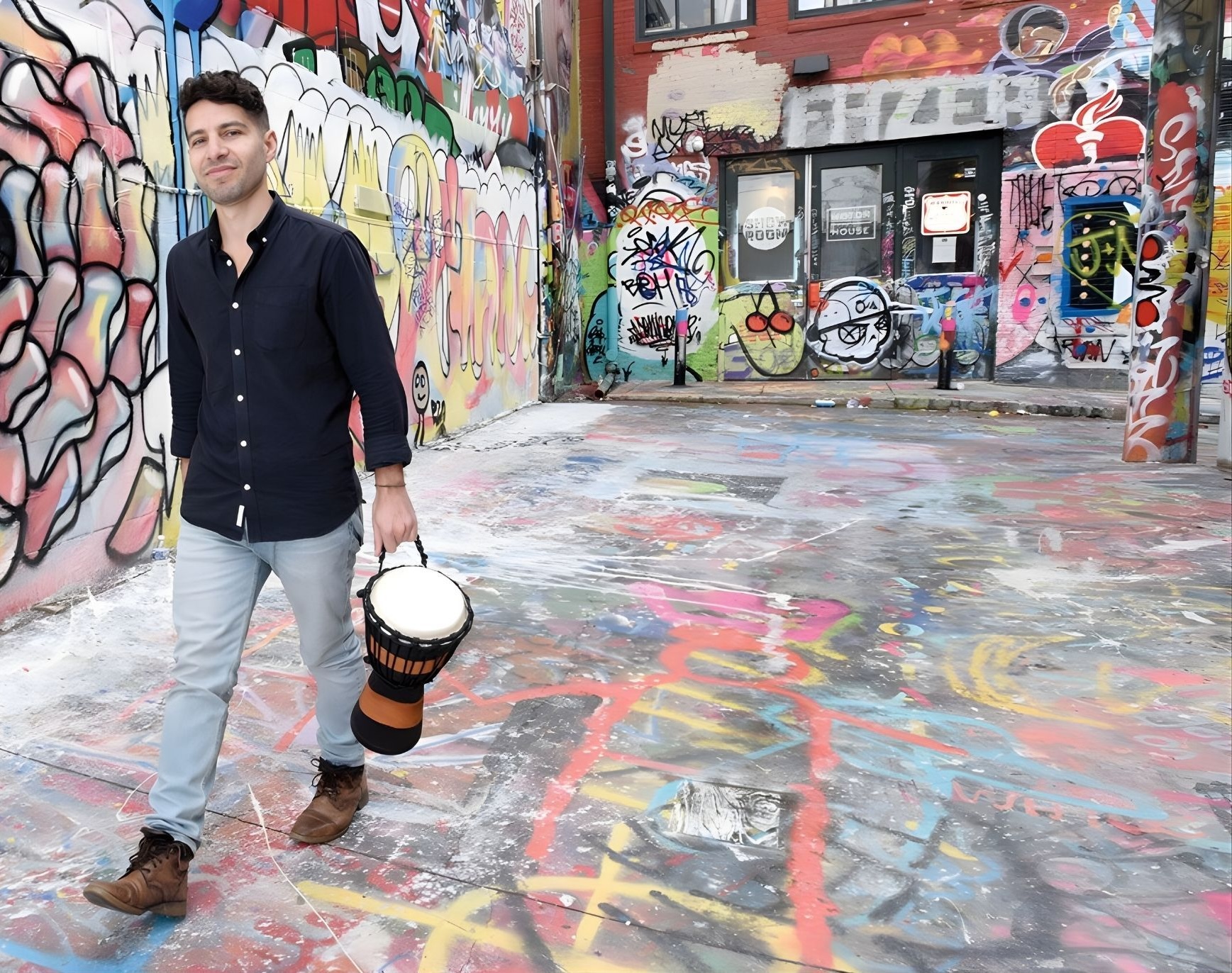 Jordan Goodman with Drum in a Graffiti Alley